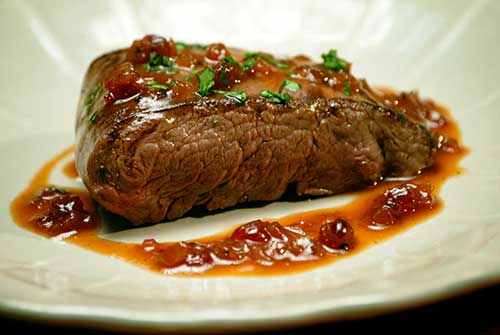 n cervum assum iura ferventia (Marinated venison saddle in prune sauce)